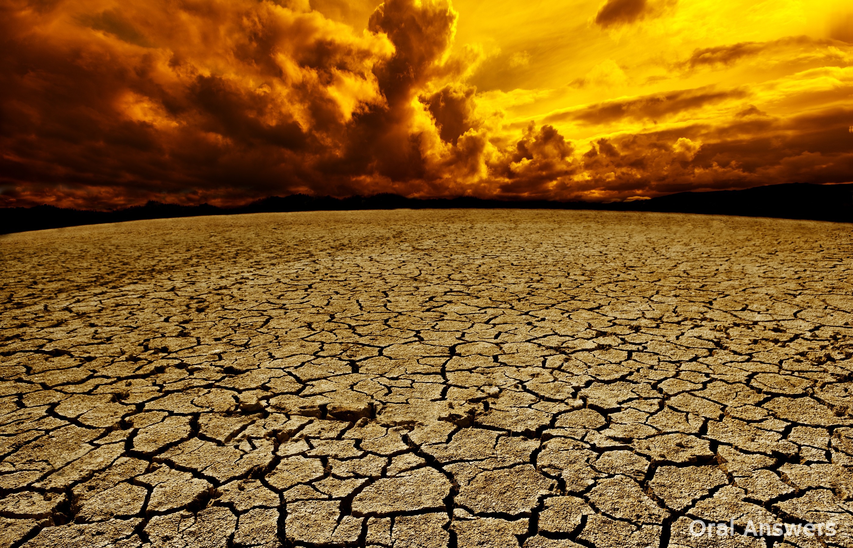 Атмосферная засуха. Потресканная земля в пустыне. Засуха земля потрескалась. Сухая растрескавшаяся земля. Пустыня трещины.